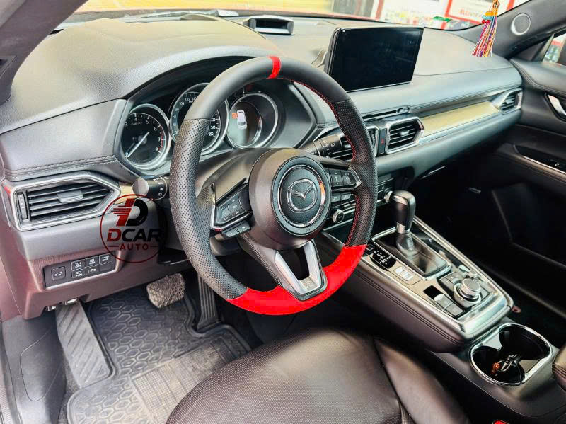 Khâu da vô lăng ô tô xe Mazda đen đỏ
