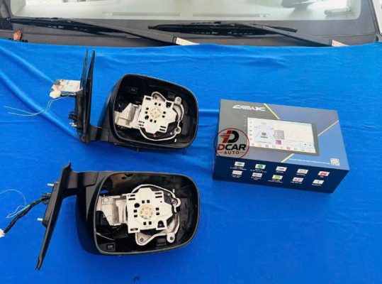 Gập gương tự động Fortuner 2011 tích hợp remote zin của xe.
